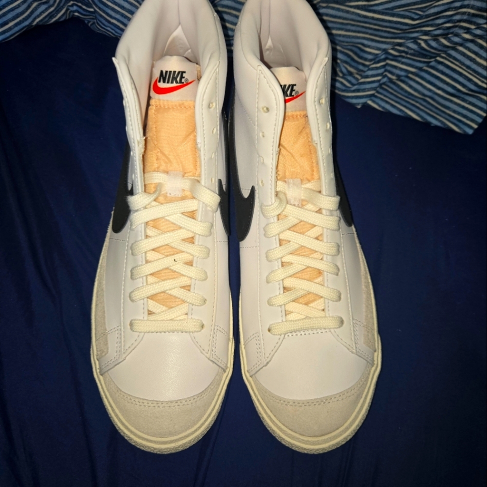 Nike White and Black High-Top Sneakers with Classic Design